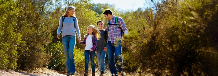 Mom, Dad and two kids on a hike