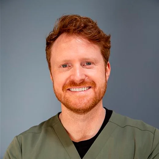 Dr. Tyler Brookings looking ahead with a big smile